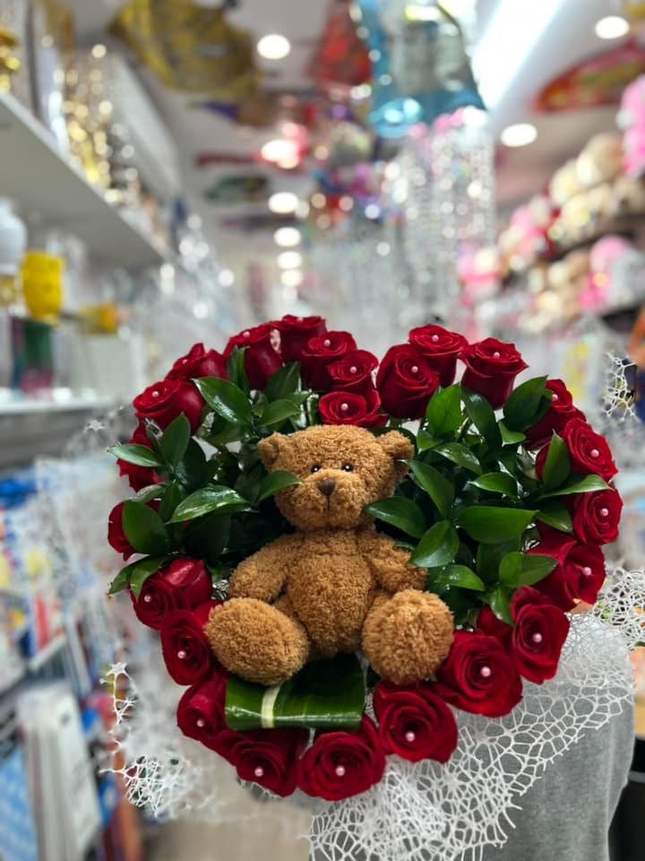 Heart bouquet with teddy bear