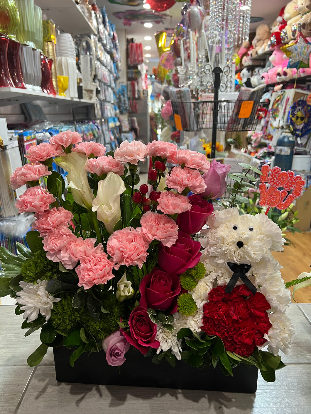 Puppy with carnations